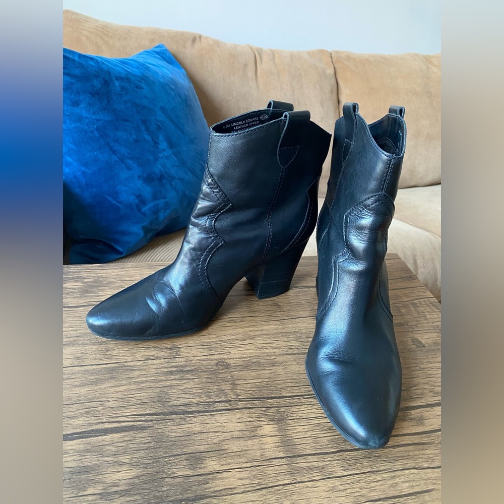 Step into Sophistication with These Western-Style Black Leather Ankle Boots